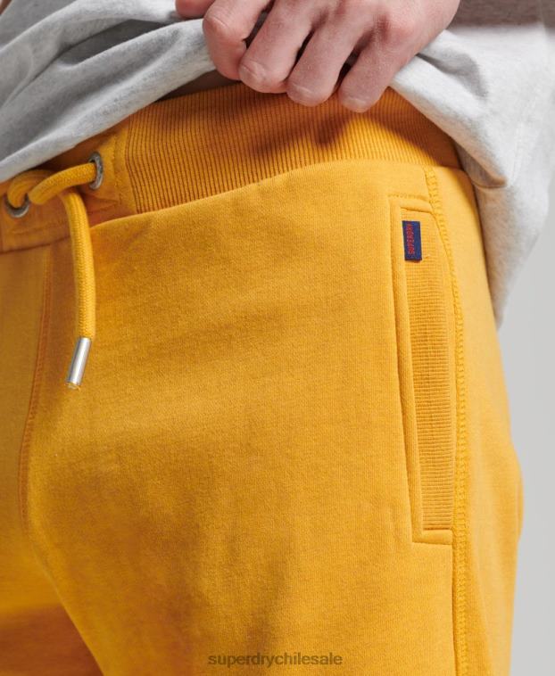 hombres Superdry amarillo shorts de algodón orgánico con logo vintage 2R68Z363