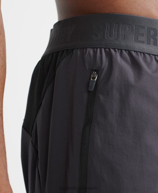 hombres Superdry gris oscuro pantalones cortos de capa premium de tren 2R68Z356