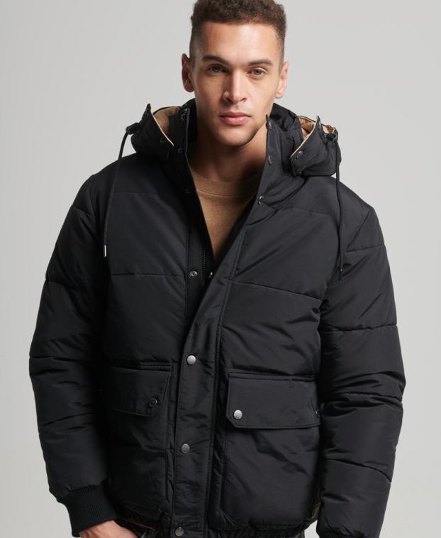 hombres Superdry azul oscuro chaqueta acolchada de montaña 2R68Z4533