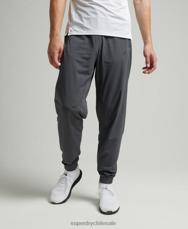hombres Superdry gris oscuro pantalones de chándal tejidos elásticos 2R68Z5402