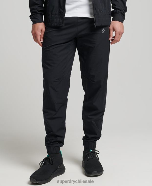 hombres Superdry negro pantalones de chándal tejidos elásticos 2R68Z5387
