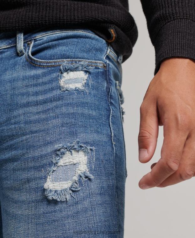 hombres Superdry azul claro vaqueros pitillo de época 2R68Z1223